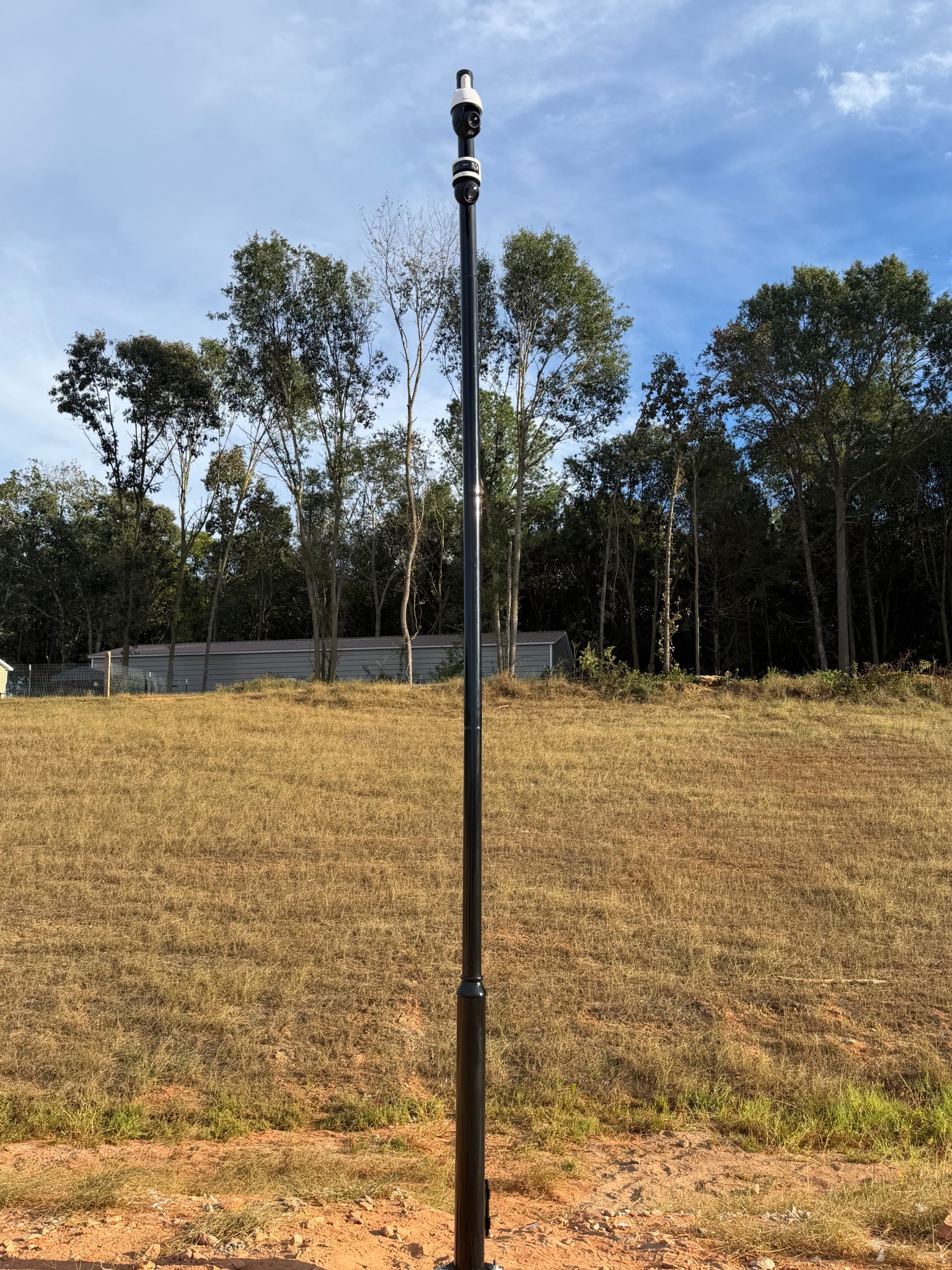Completed commercial camera pole with two security cameras